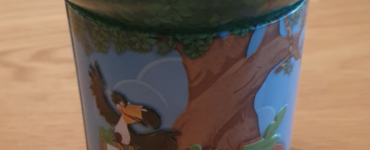 Tumble Tree game box featuring vibrant illustrations of a tree and a bird, designed for family-friendly fun and skill-building activities.
