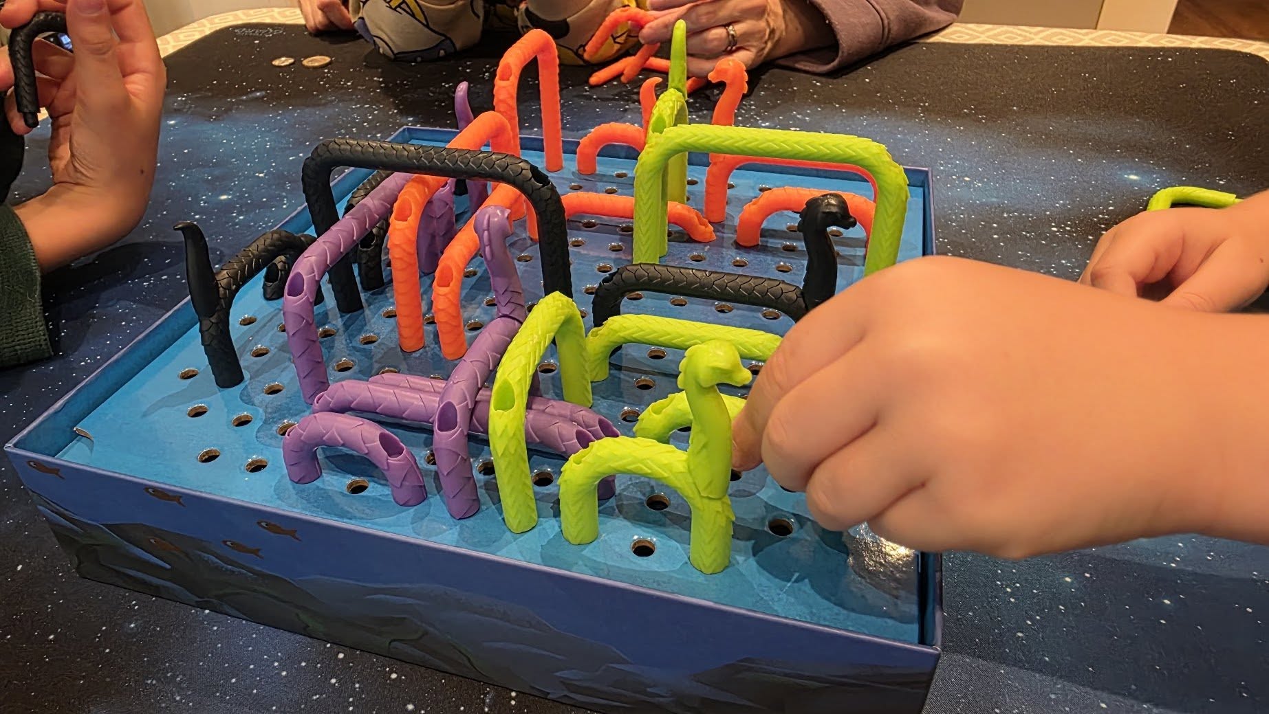 May be an image of 1 person, children's toy and text