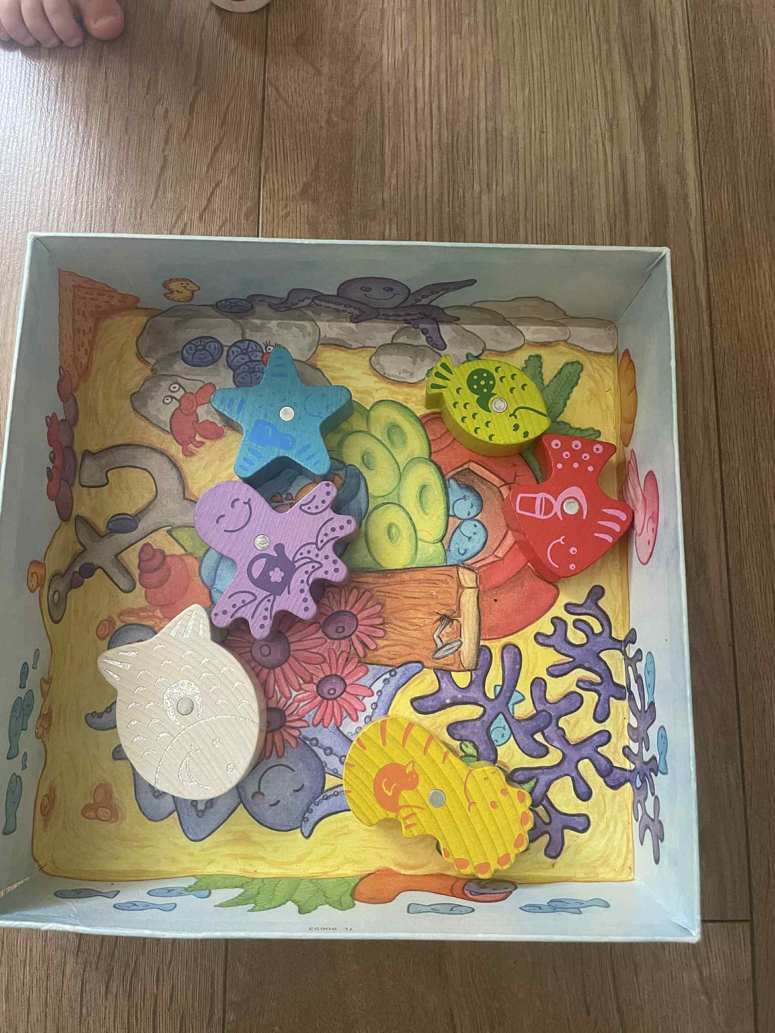 May be an image of toy, gingerbread biscuit and text