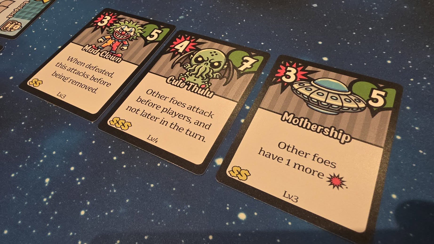 May be an image of text that says "18 5 this attacks thisattacksbefore When Mad-Clown Mad Whendefeated Clown being'removed. beino defeated, removed. before Lv3 not before Other Otherfoesattack Cute'Thulu Thulu foes players attack later in the and turn. Lv4 3E ਬवੁ 5 Mothership Mothership have Other Other 1 more foes Lv3 Lv3"