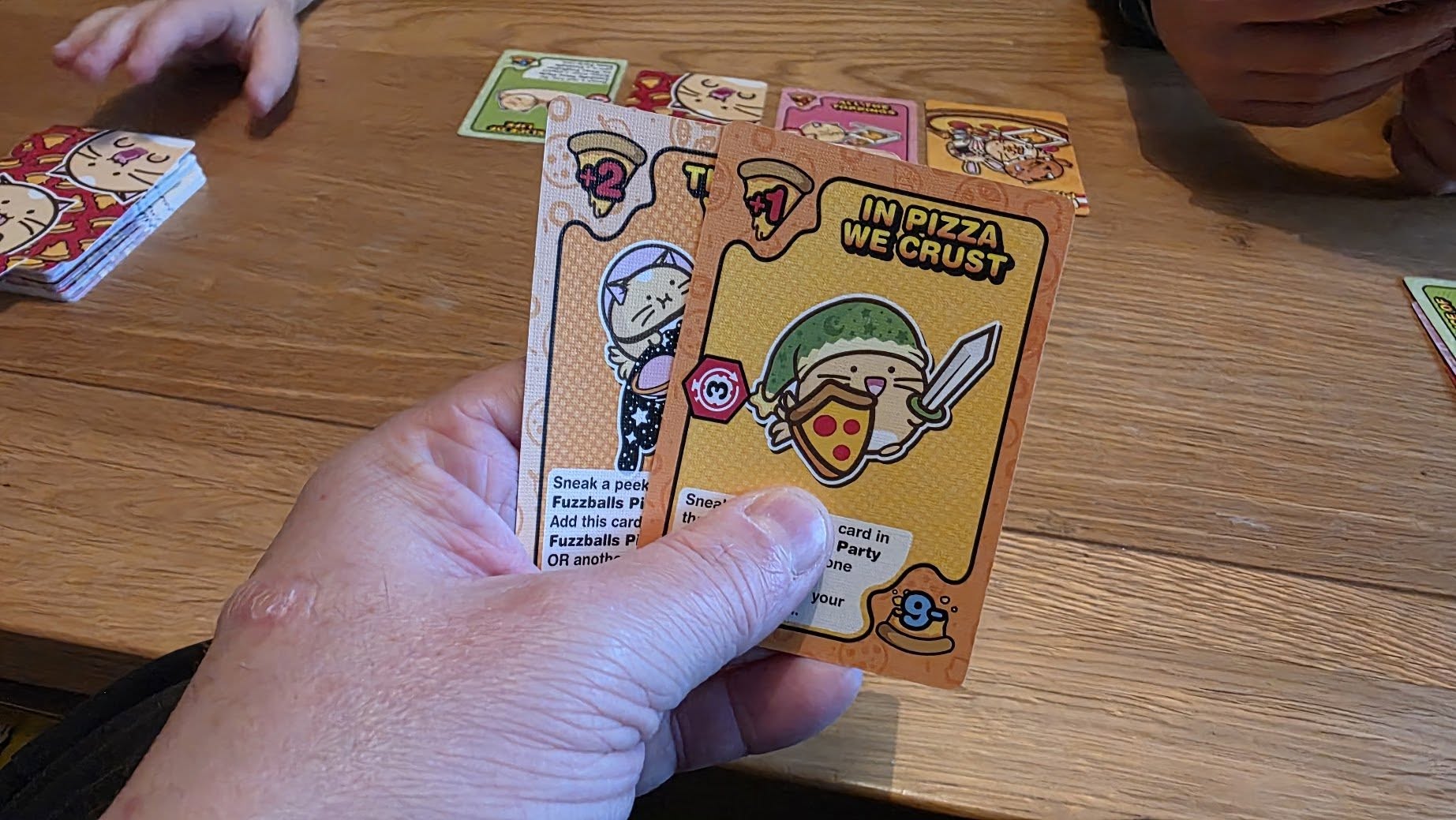 May be an image of text that says "غن 국보한표리의 WECRUST WE IN PIZZA INPIZZA CRUST Sneak peek Fuzzballs Pi Add card Fuzzballs P OR anoth- Snep the card Party in in ono your"