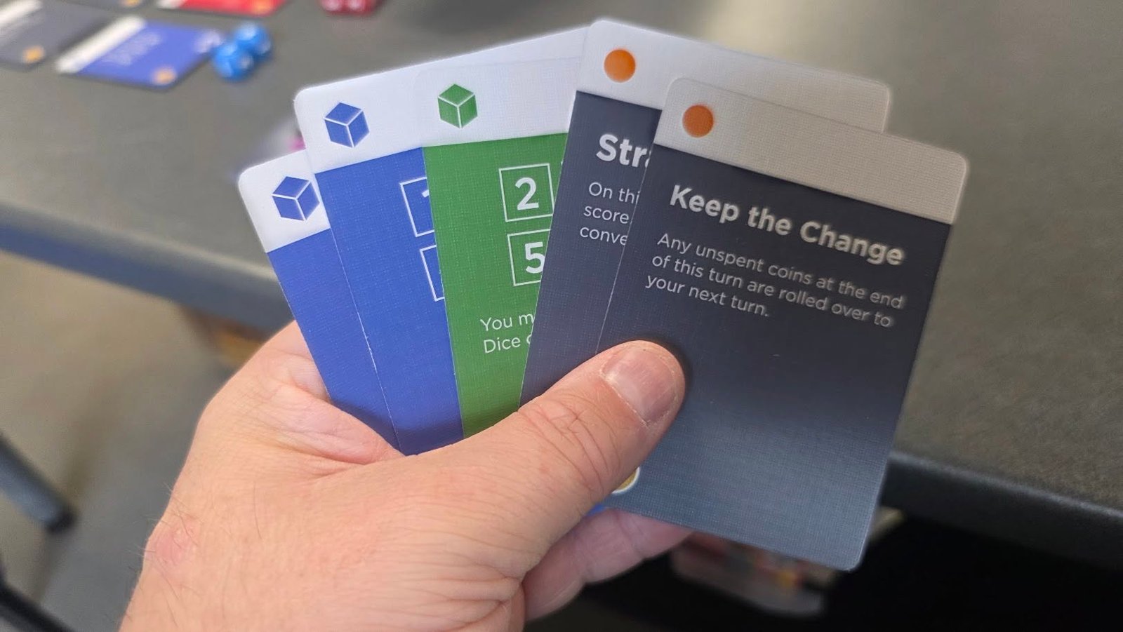May be an image of text that says "Stri 2 On Onthi thi score Keep the Change 5 5 CONVE Any this fthisturn of unspent your yournextt ofthiturnare unspentcol ns turn are nextturn. next turn. yournextturn. unspent.coinsatthe rolled over theend You ท Dice"